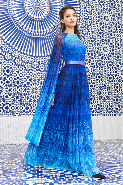 MOSAIC PRINT DRAPED MESH GOWN WITH SET IN CAPELET