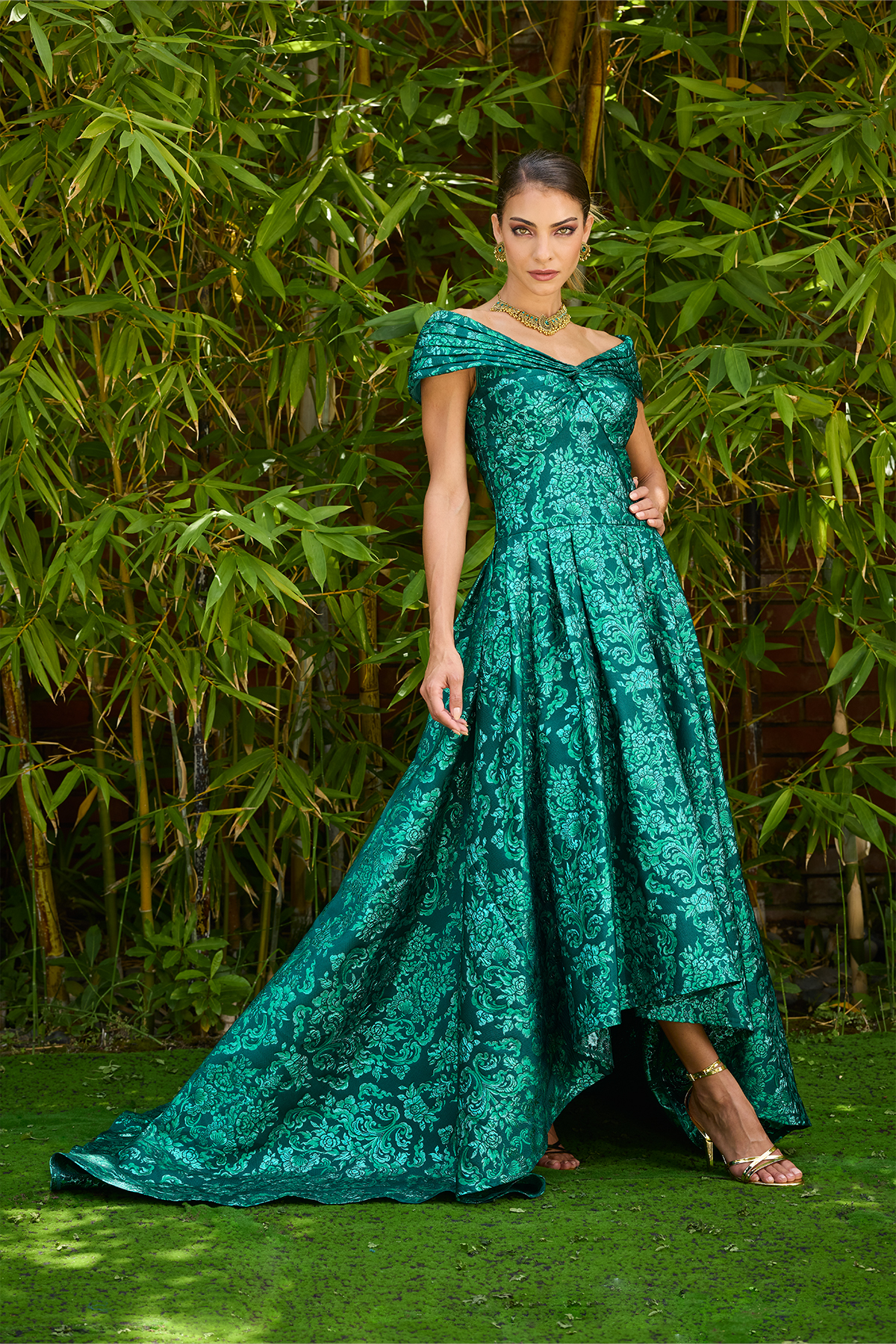 EMERALD GREEN MULTI STUPA MOTIF JACQUARD OFF-THE-SHOULDER SWEEPING HIGH-LOW GOWN