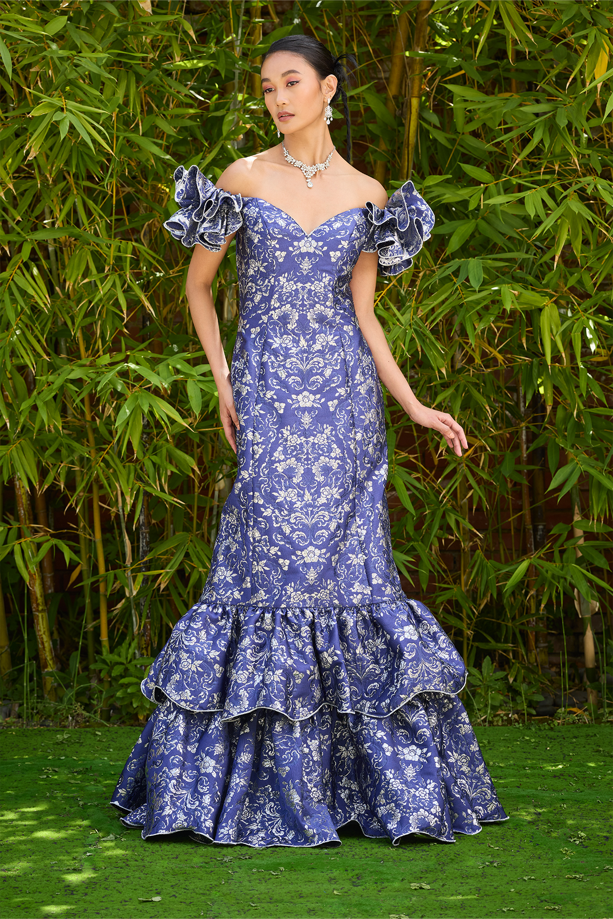 BLUE IRIS MULTI STUPA MOTIF JACQUARD OFF-THE-SHOULDER GOWN WITH TIERED FLOUNCE DETAIL