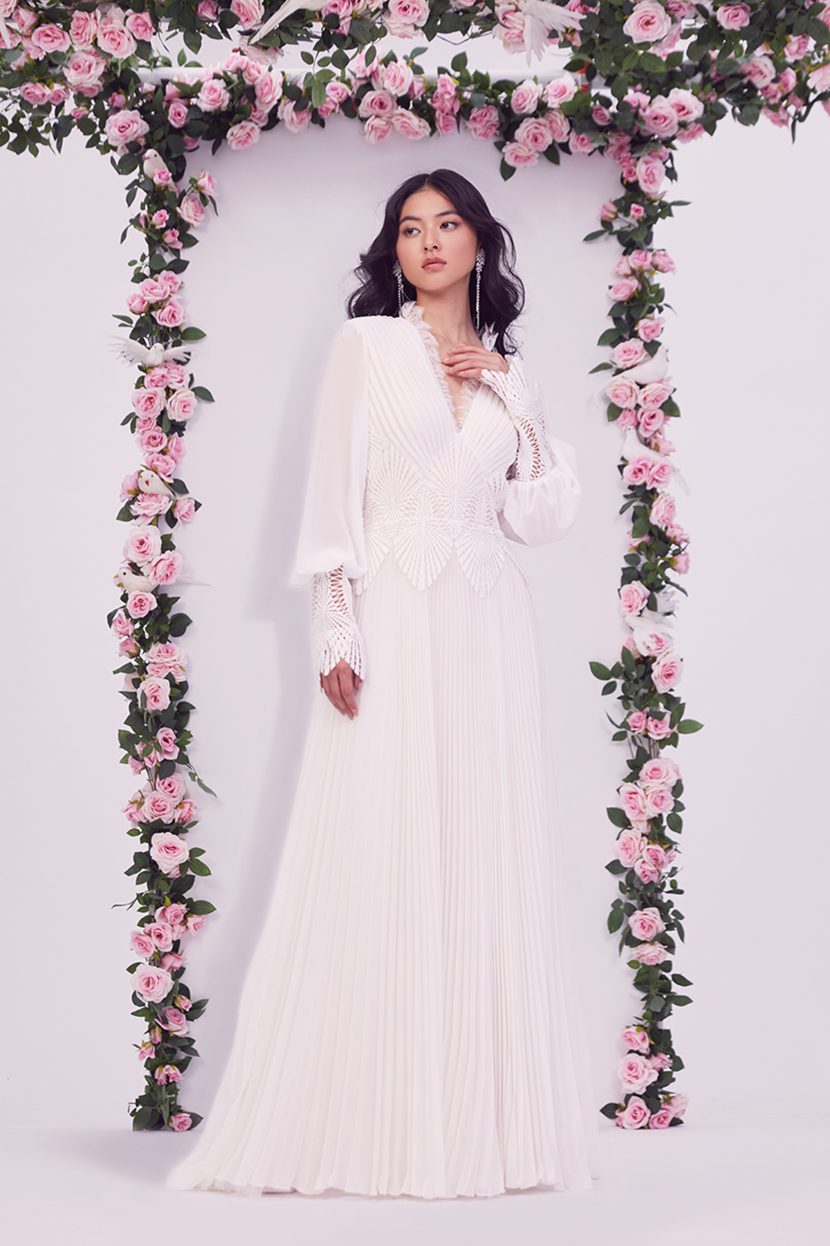 IVORY/PETAL PLEATED CHIFFON V-NECK BISHOP SLEEVE FULL-SKIRTED GOWN WITH FEATHER CROCHET LACE DETAIL