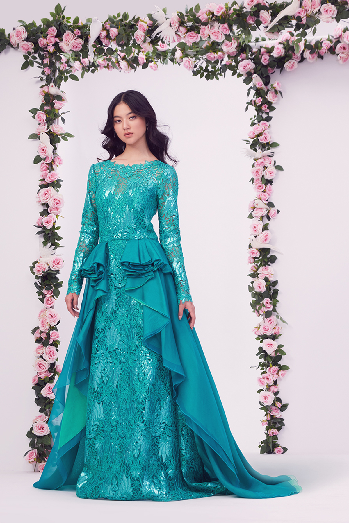 CARIBBEAN PAILLETTE-EMBROIDERED TULLE LONG SLEEVE ILLUSION GOWN WITH CASCADING CHIFFON LAYERED RUFFLES
