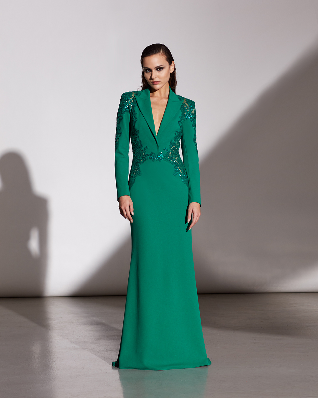 PINE/NUDE TEXTURED CREPE V-PLUNGE LONG SLEEVE COLLAR GOWN WITH PAILLETTE EMBROIDERED TULLE APPLIQUÉ