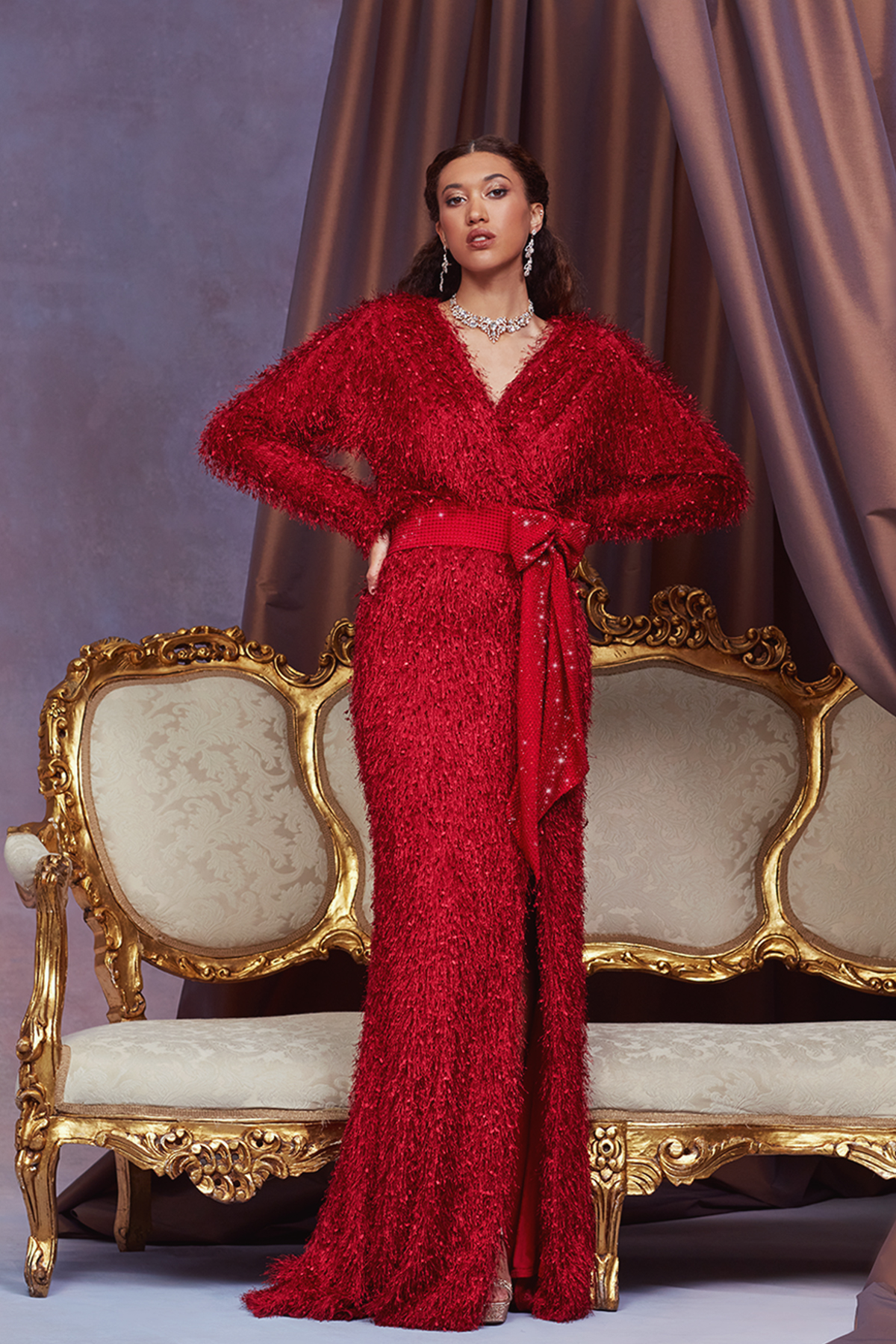 WINE EYELASH YARN SURPLICE NECK DOLMAN SLEEVE GOWN WITH DIAMANTE SASH BELT AND FRONT SLIT