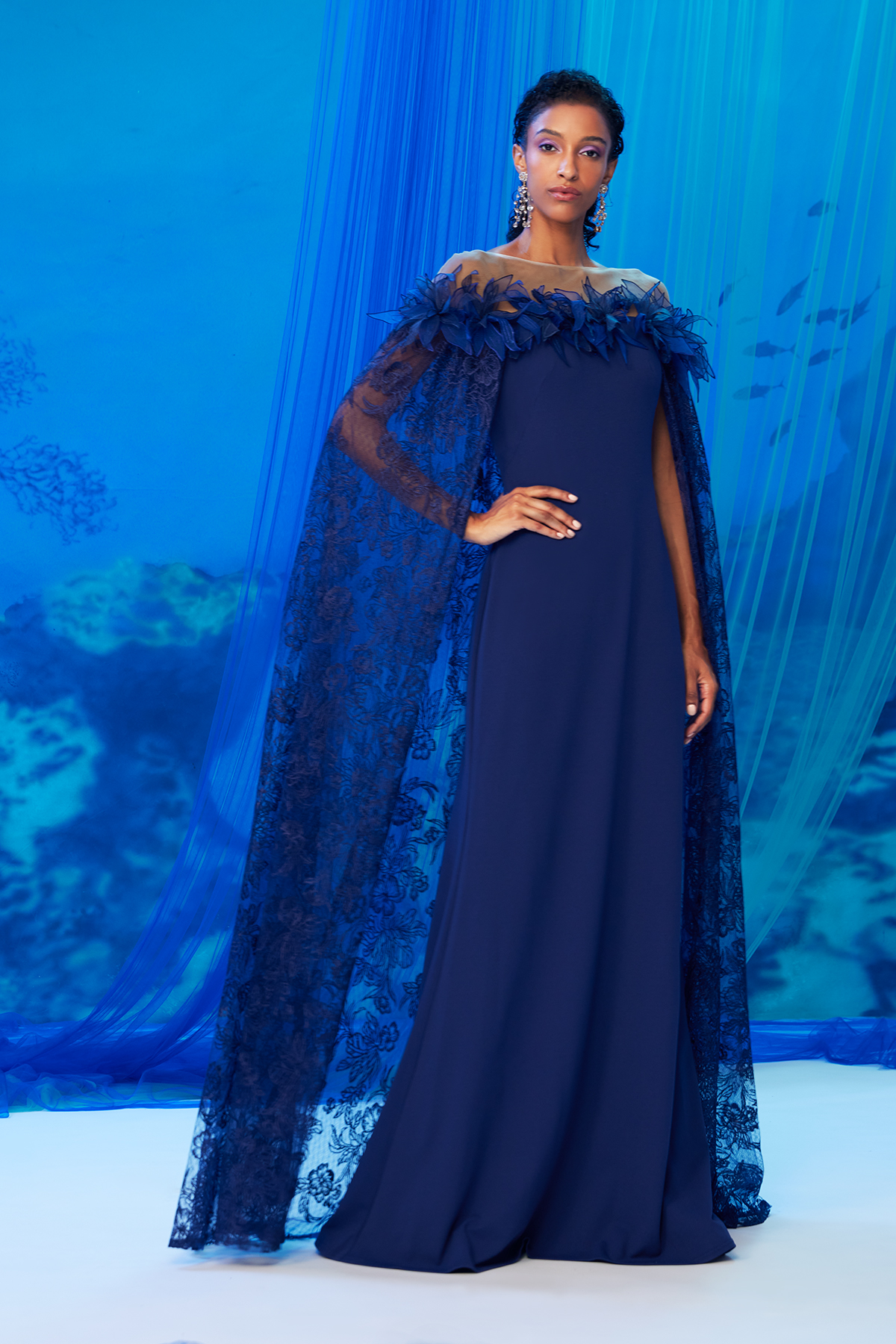 NOTTE TIDAL FLOWER EMBROIDERED TULLE AND TEXTURED CREPE ILLUSION CAPE GOWN WITH 3D FLOWER EMBELLISHMENT