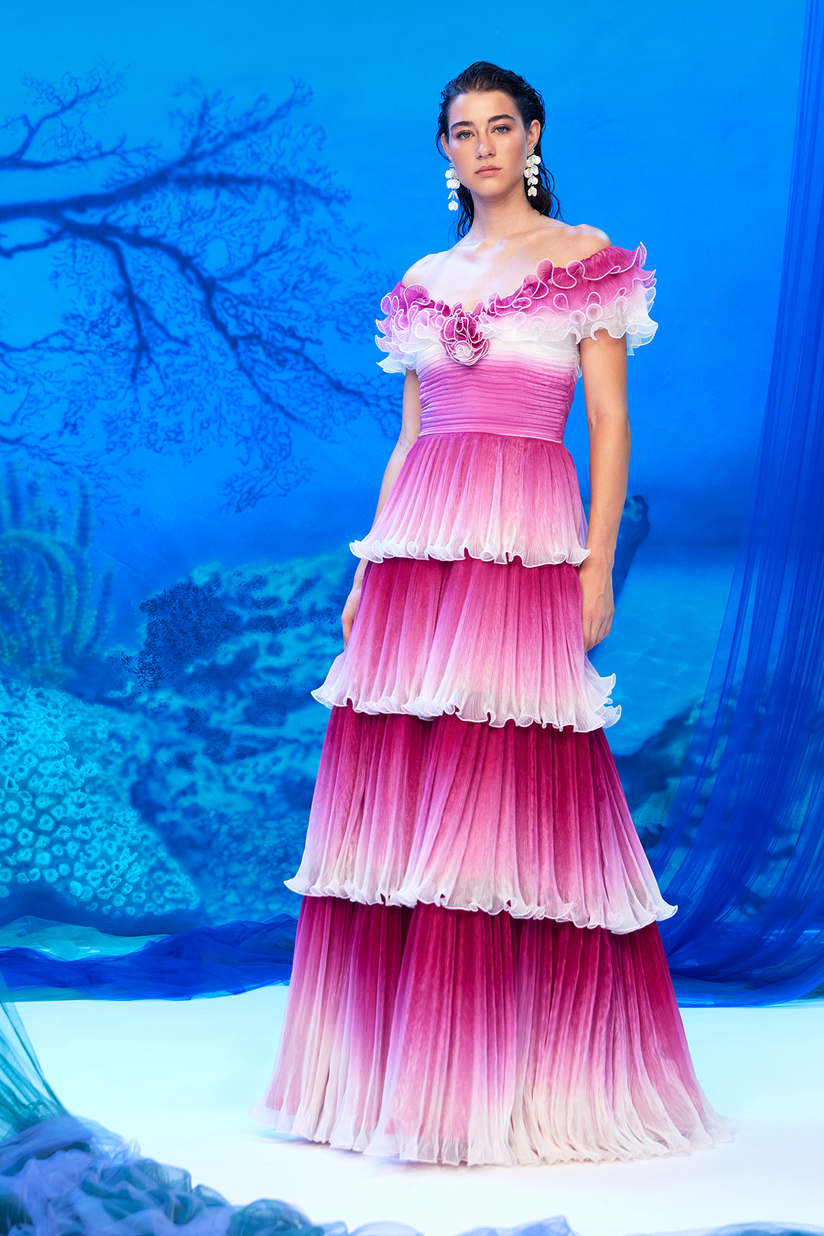 WATER LILY OMBRE PLEATED FOILED CHIFFON OFF-THE-SHOULDER SHORT SLEEVE TIERED GOWN WITH LAYERED-FLOUNCE NECKLINE AND SEA SPRAY-INSPIRED HEM DETAIL