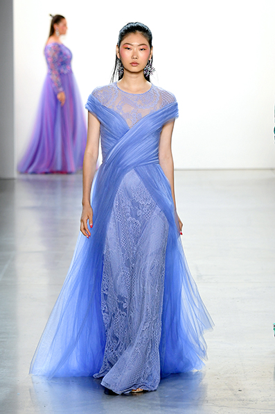 LAVENDER LACE CAP SLEEVE  GOWN WITH CRISS CROSS FULL OVERLAY SKIRT