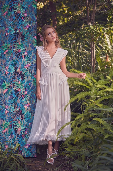 PLEATED GEORGETTE SLEEVELESS DRESS WITH LACE INSET AND RUFFLE DETAIL